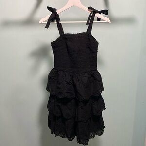 Black dress size XS. Riffled bottom